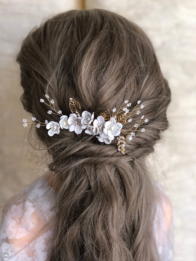 hairstyle for bridesmaids with a white floral hair comb i