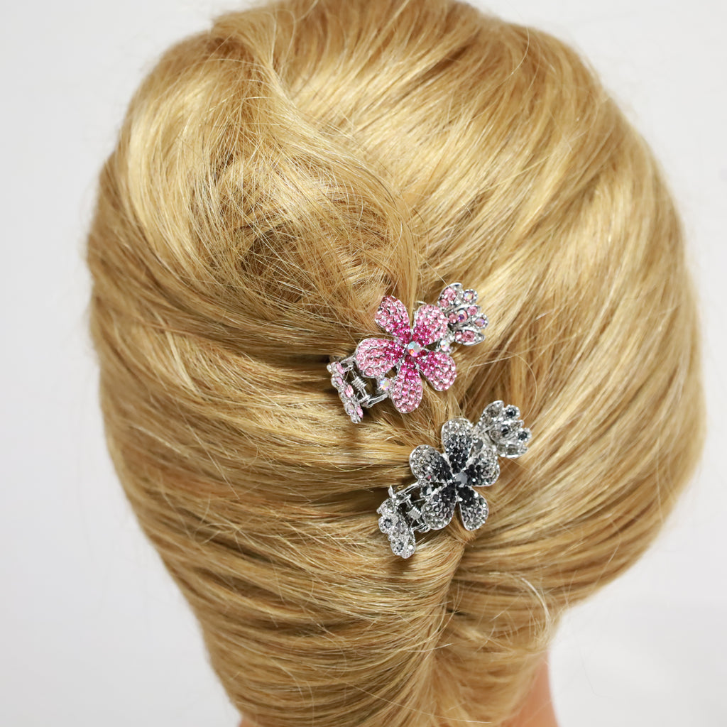 Shiny black floral hair claw with a luxurious, high-end look.