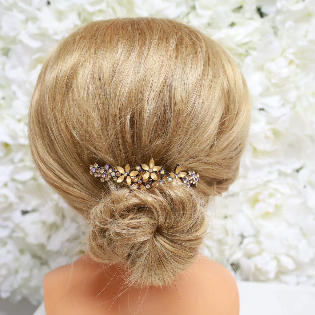 Side view of floral crystal hair barrette styled on a low bun, showcasing elegant and secure hair accessory fit.