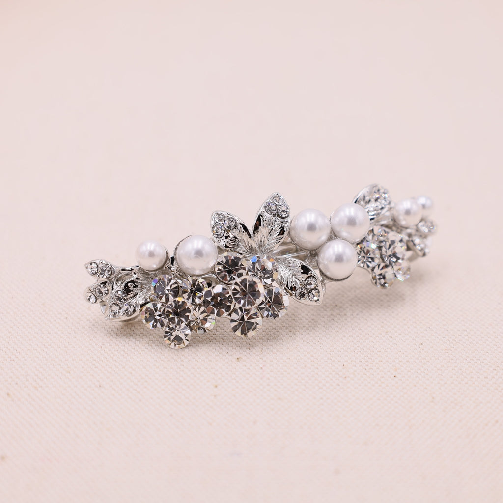 Add a touch of luxury to your hairstyle with this sparkling crystal hair barrette