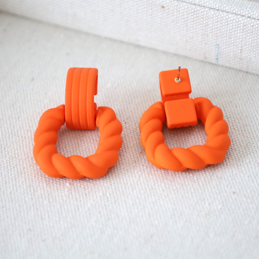 Orange Twisted Design Drop Earrings