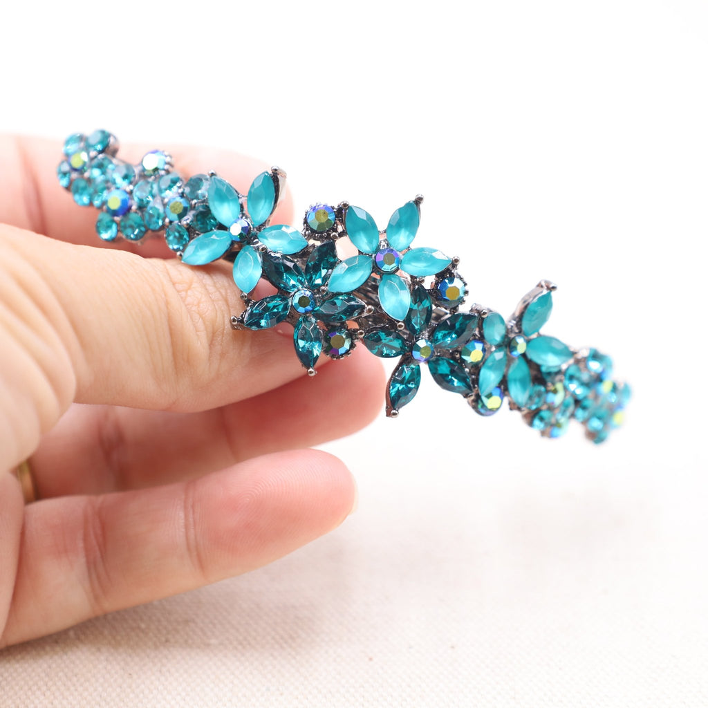 Vibrant teal hair accessory designed for thick, luscious tresses.